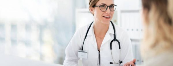 Cropped shot of an attractive young female doctor consulting with a patient inside her office at a hospital